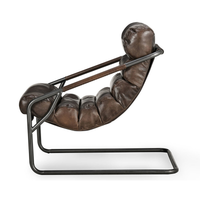 Side view of the Truffle Brown leather chair showing its curved sling and cantilever iron base