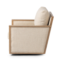 Side view of the Natural swivel chair showing its upholstered panel and sloping ash frame