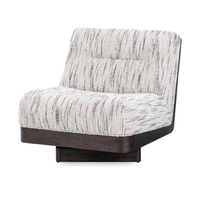 Cocoa Cream armless swivel chair with patterned upholstery and a walnut shell
