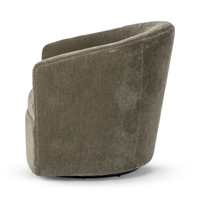 Side view of the Olive Moss chair's sloping arm and upholstered back