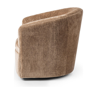Side view of the Walnut Heather chair's sloping arm and curved upholstered back