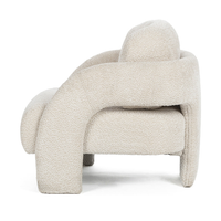 Side view of the Natural chair's sweeping arm and open gap above the seat