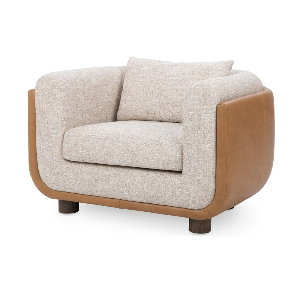 Latte accent chair with pale woven upholstery and a tan leather outer back