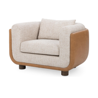 Latte accent chair with pale woven upholstery and a tan leather outer back