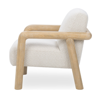 Side view of the Sand chair showing its angled back and rounded wood frame