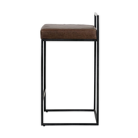 Side view of dark brown low-back leather counter stool showing the low back and rectangular black iron base.