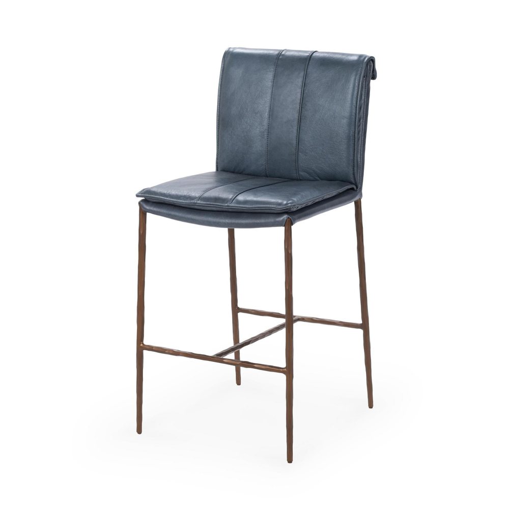 Slim-frame blue leather counter stool in a three-quarter front view, showing the stitched seat and brown iron legs