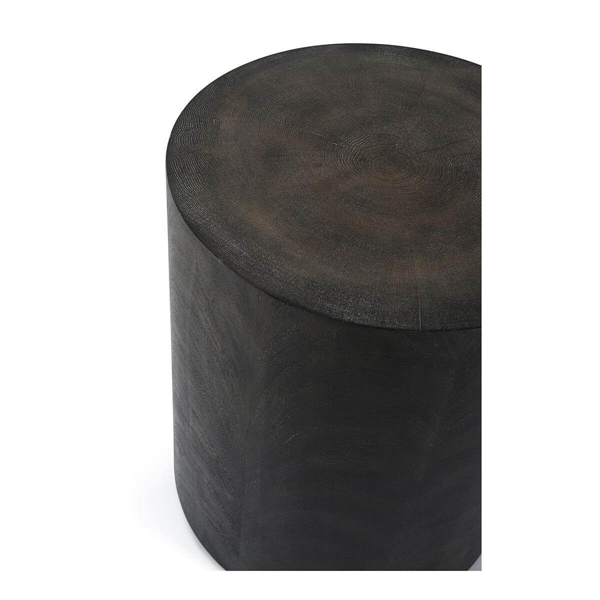 Diagonal view of dark cylindrical accent table, minimalist design.
