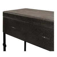 Close-up of leather texture on box.