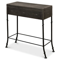 Embossed leather box on stand, angled view.