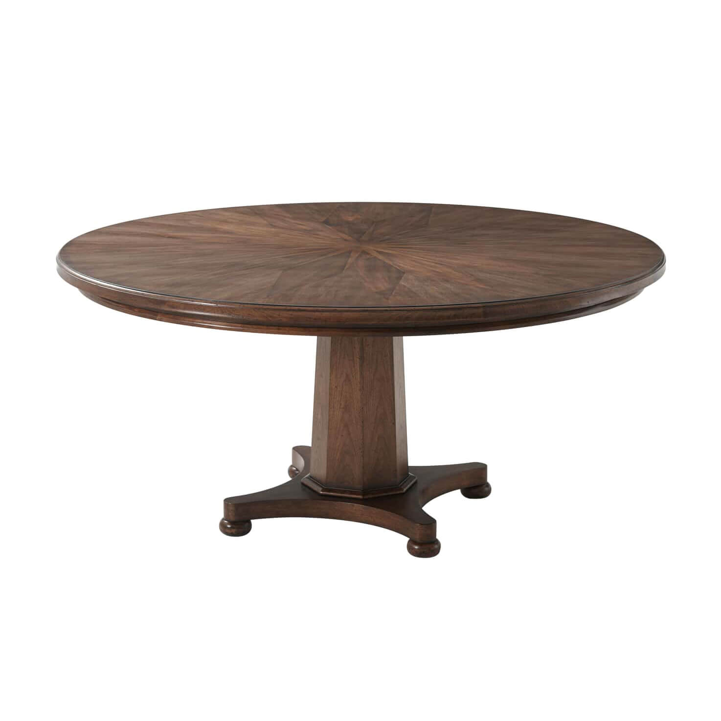 Round wooden dining table with pedestal base, angled view.