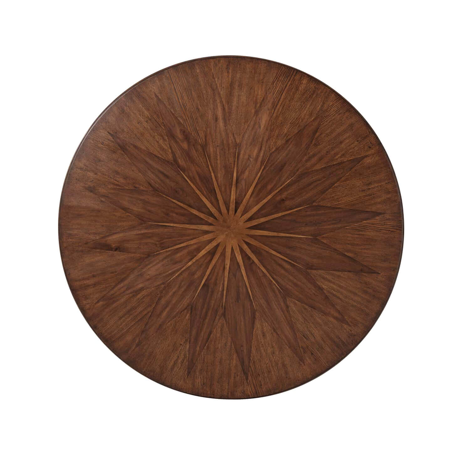 Top view of round dining table with starburst pattern.