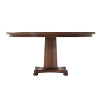 Side view of wooden dining table with pedestal base.