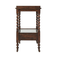 Side view of antique serving table with spiral legs.