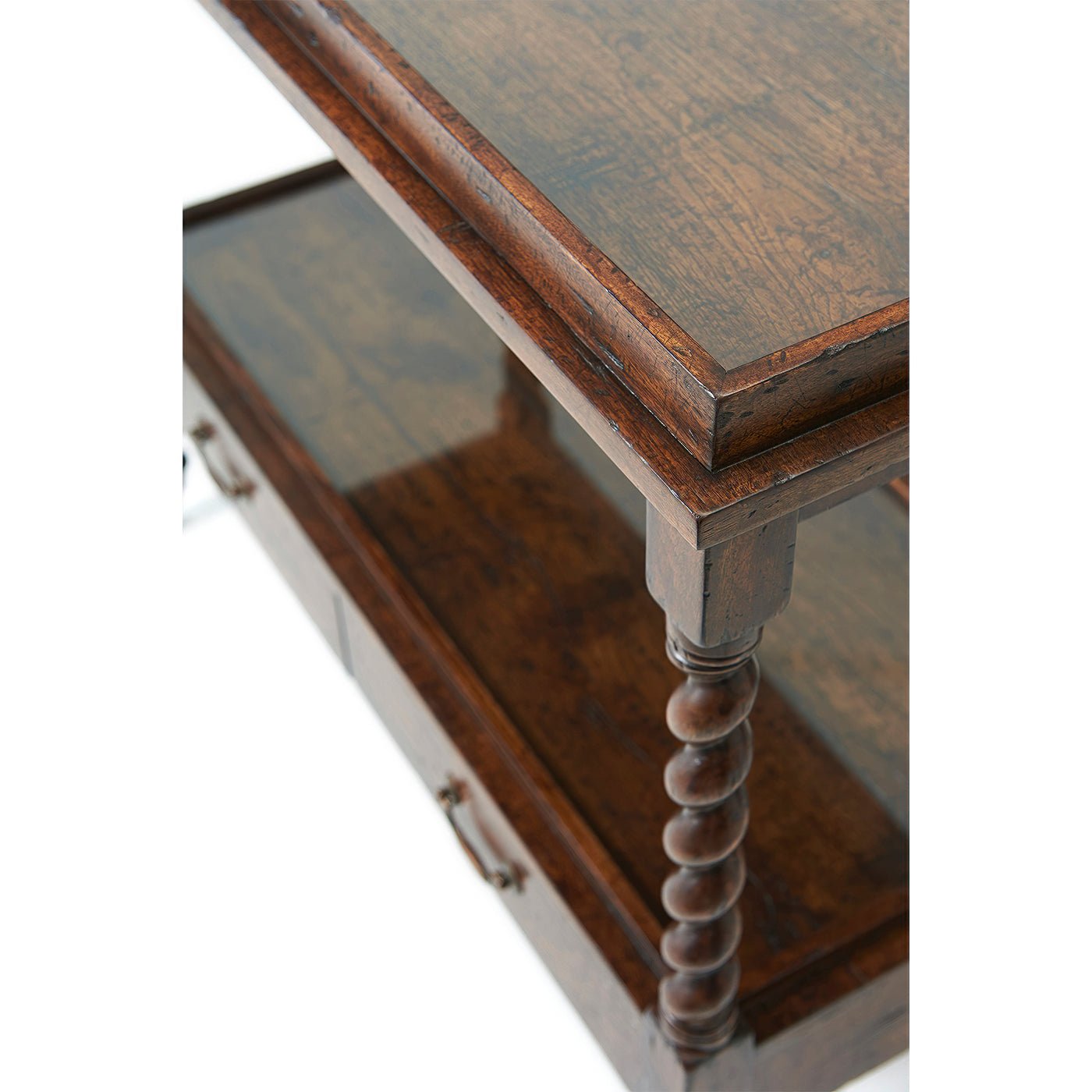 Close-up of antique serving table top and leg detail.