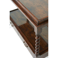 Close-up of antique serving table top and leg detail.