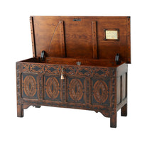 Open English blanket chest revealing interior and details.