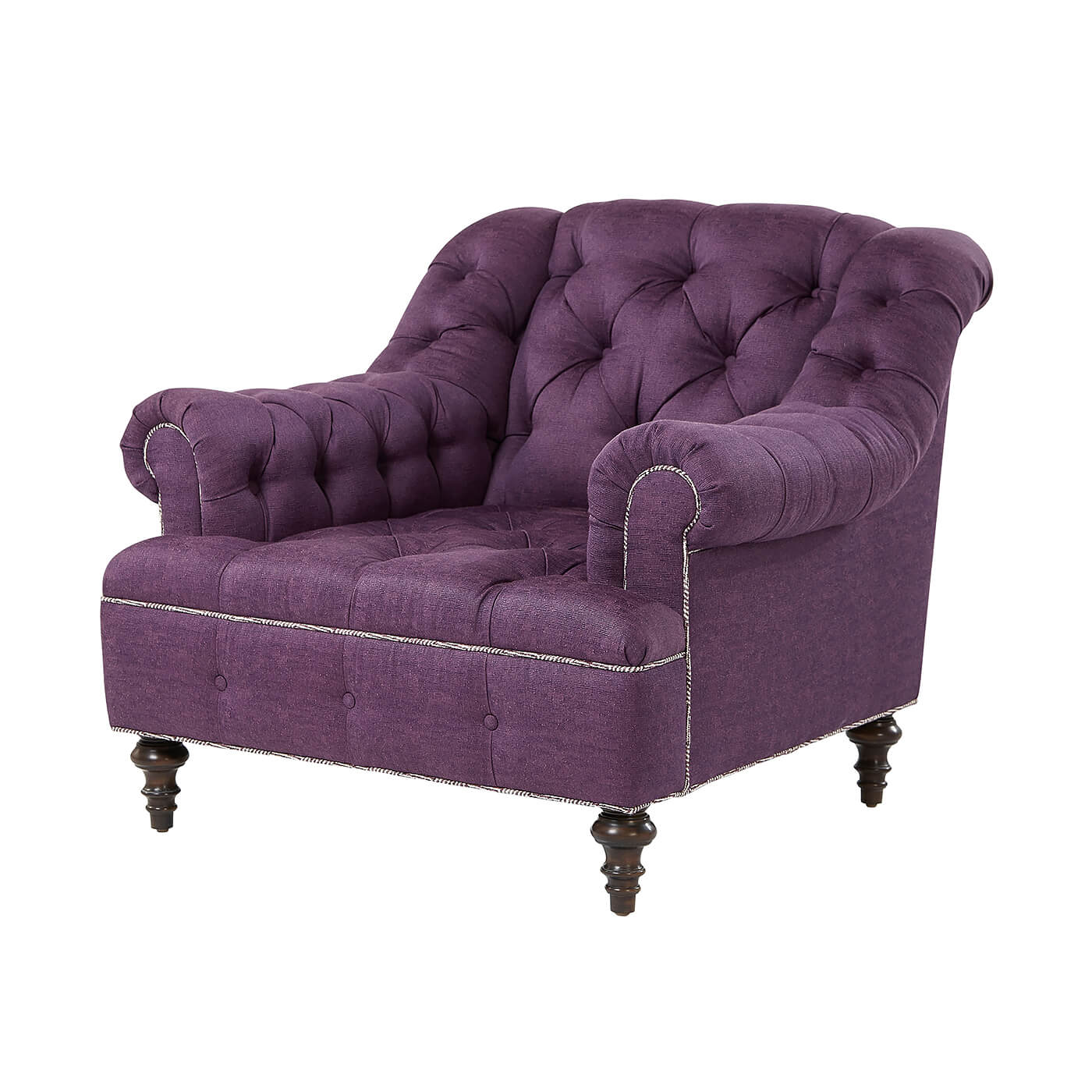 Angled perspective of purple tufted club chair.