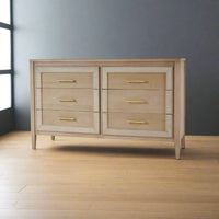 Coastal dresser in bright room, wide angle view.