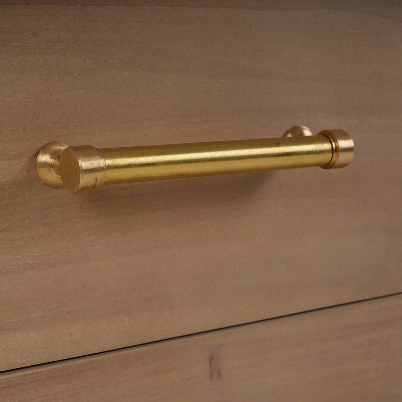 Close-up of coastal modern nightstand handle.