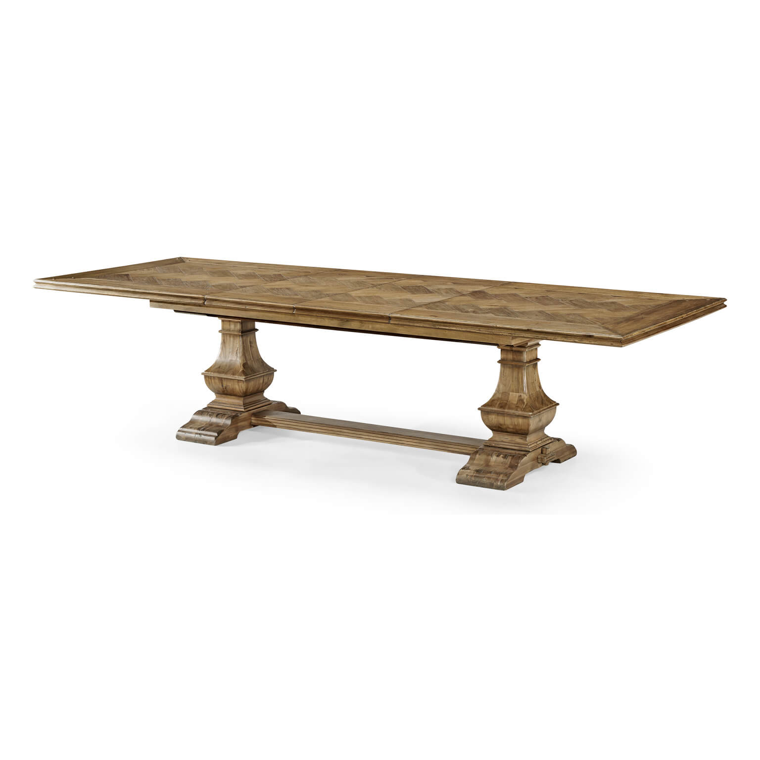 Angled view of wooden dining table with intricate design.