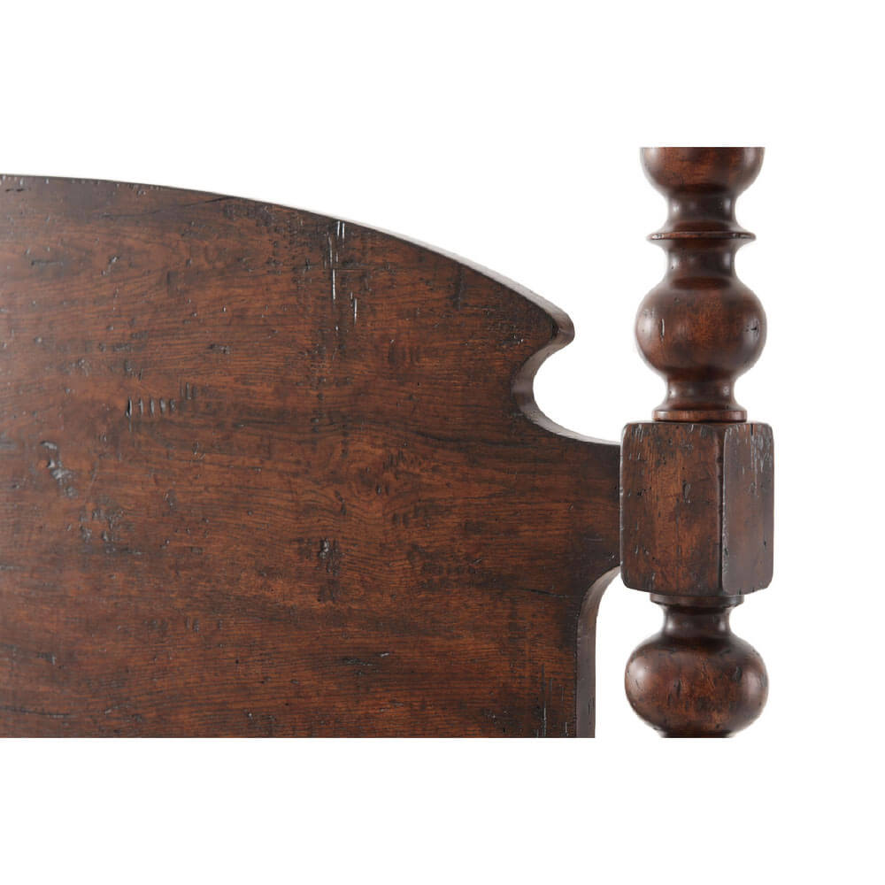 Close-up of headboard detail, dark wood king bed.