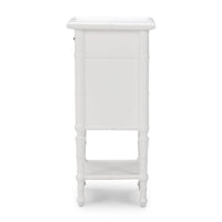 White end table side view showing leg details.