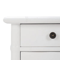 White end table close-up, drawer corner and knob detail.