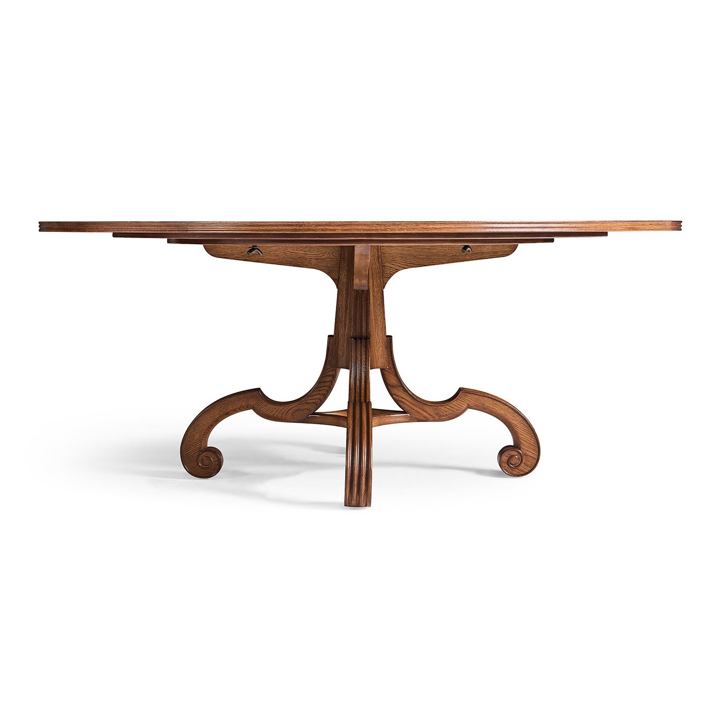Profile of oak dining table's pedestal and curved legs.