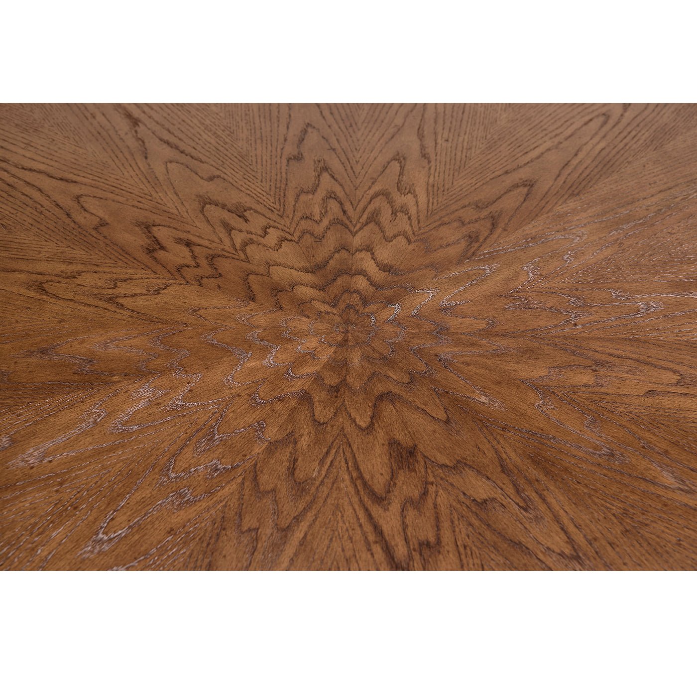 Close-up of oak dining table's intricate wood grain design.