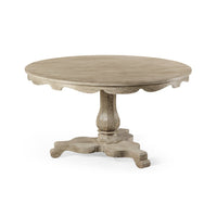Round wood pedestal dining table, side view.