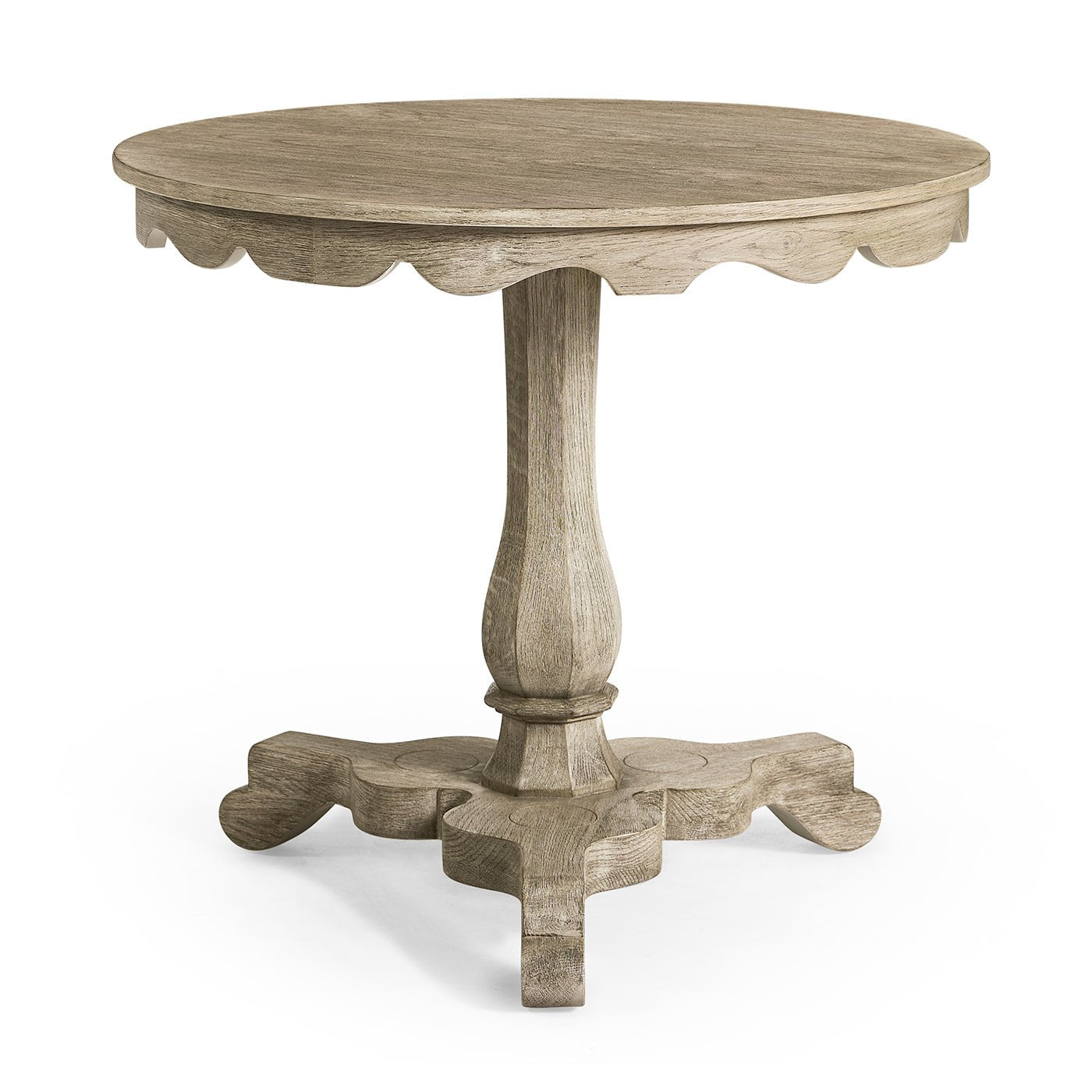 Rustic round end table with carved base and pedestal.