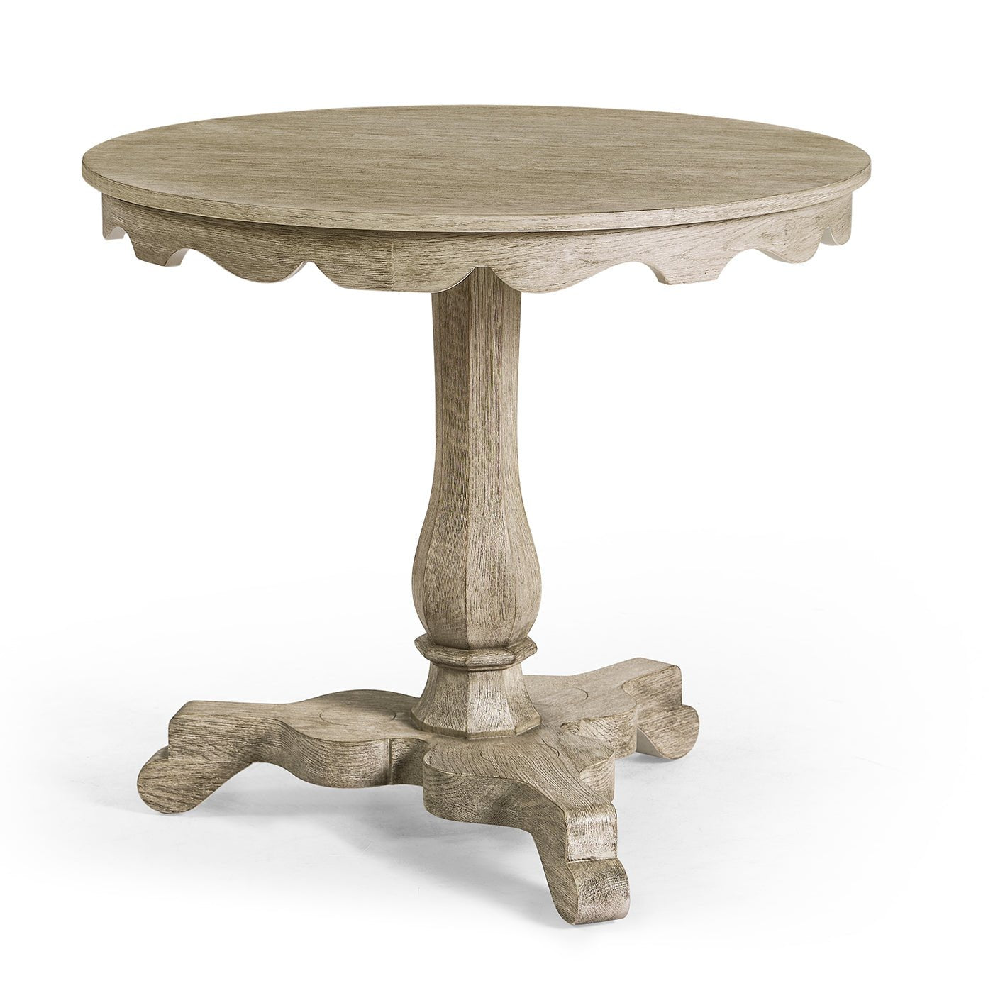 Grayed oak round end table with decorative edges.