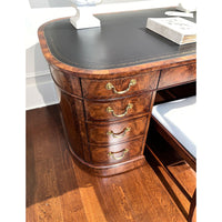 English leather top desk, close-up drawer handles and wood detail.
