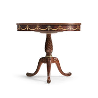 Mahogany side table, full side profile, ornate accents.