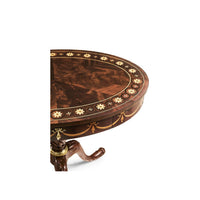 Close-up of mahogany side table corner, decorative pattern.
