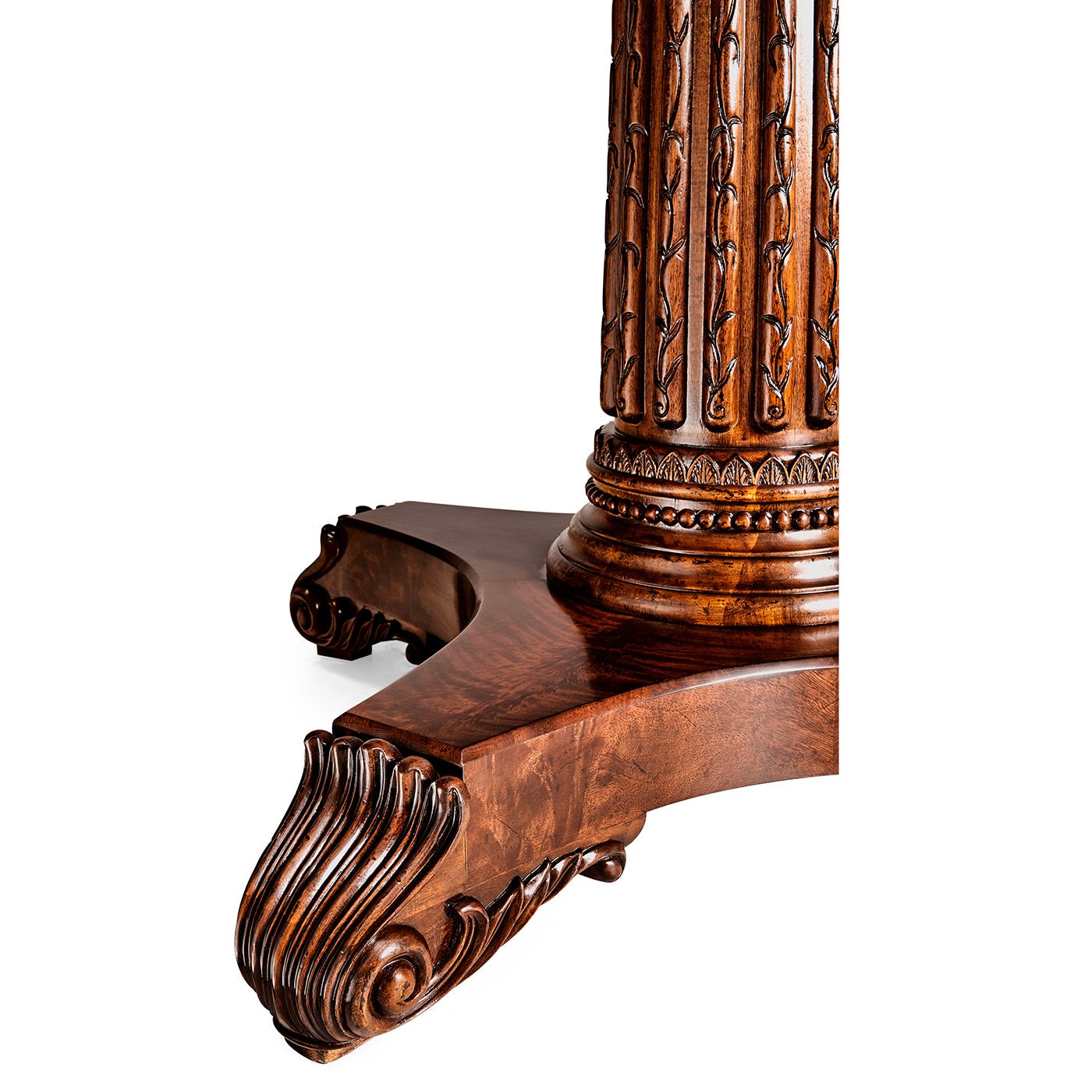 Detailed pedestal base of poker table, carved mahogany.