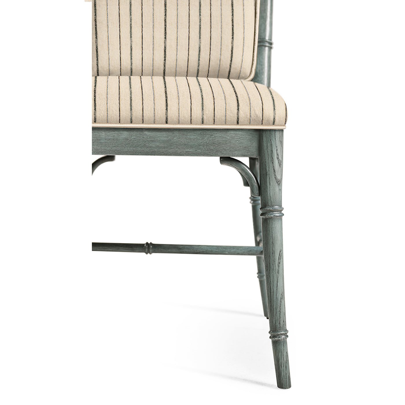 Close-up of dining chair's leg and seat design.