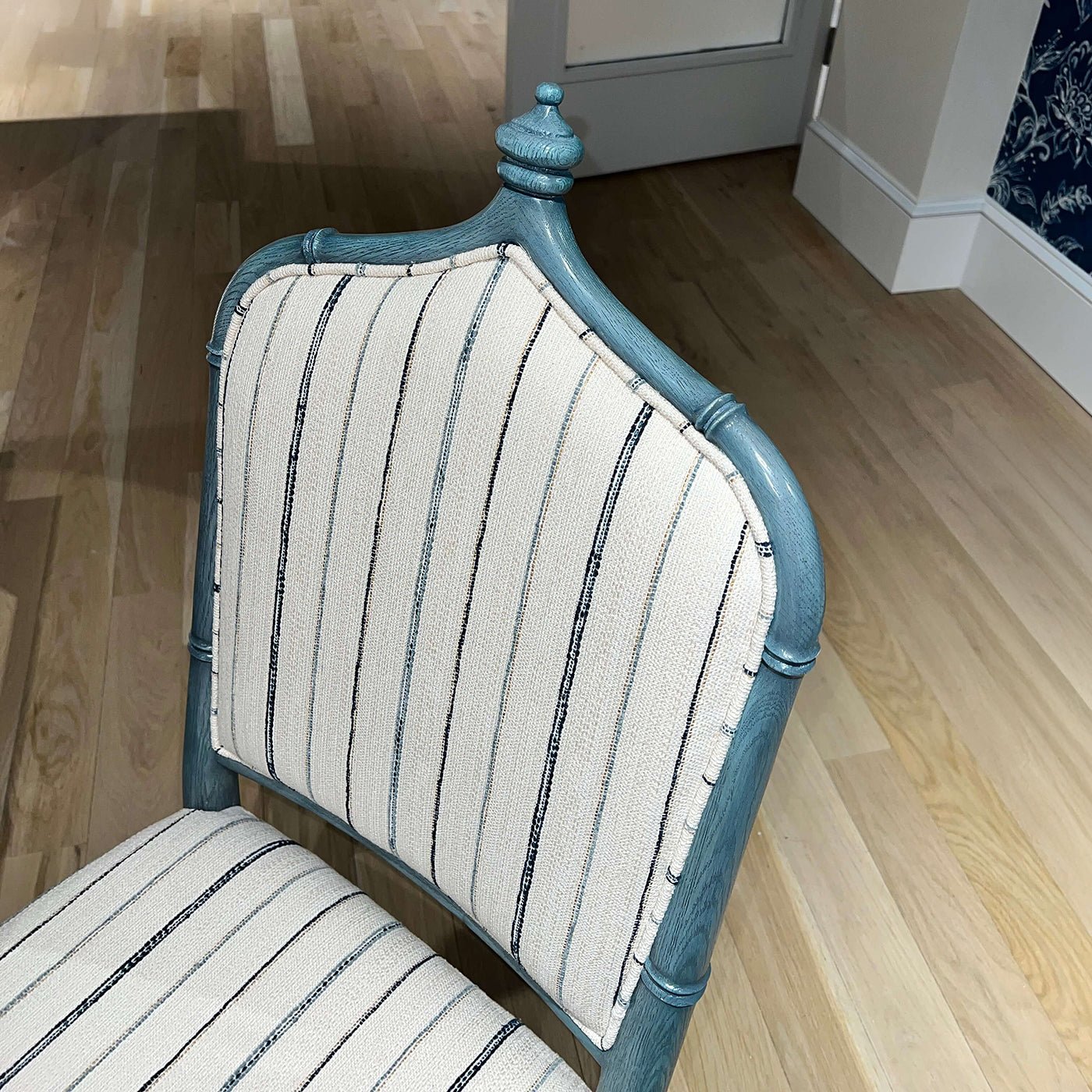 Dining chair detail, top design and fabric pattern.