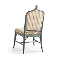 Dining chair, back view showcasing striped upholstery.