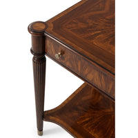 Detailed view of end table corner and drawer handle.
