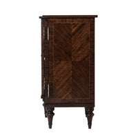 Side view of breakfront credenza with intricate detailing.