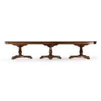 Front view of triple pedestal mahogany dining table.
