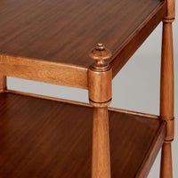 Wood finish detail of etagere corner post.