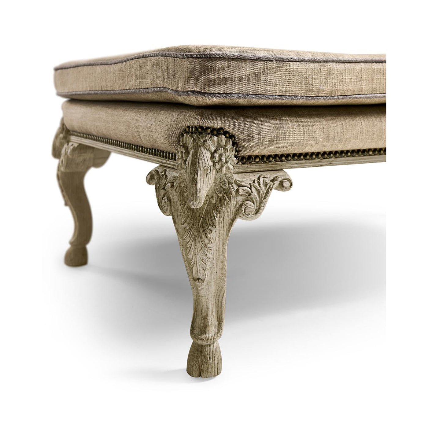 Side leg detail on English Rococo upholstered bench.
