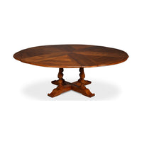 Extended round dining table, wooden design, top view.