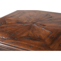 Detailed top pattern of rustic accent table with wood texture.