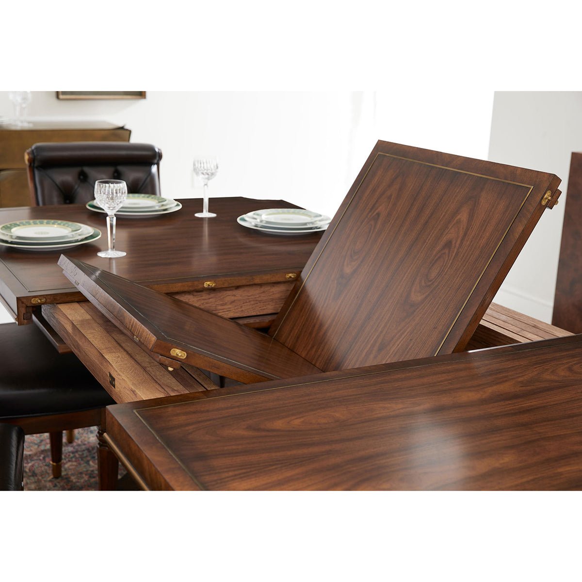 English traditional dining table leaf extension in action.