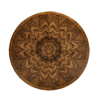 Detailed top view of round dining table pattern.