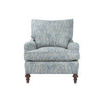 Blue paisley upholstered armchair, front view.
